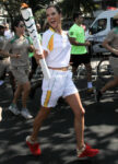 Alessandra Ambrosio Runs With Olympic Flame Through Rio De Janeiro
