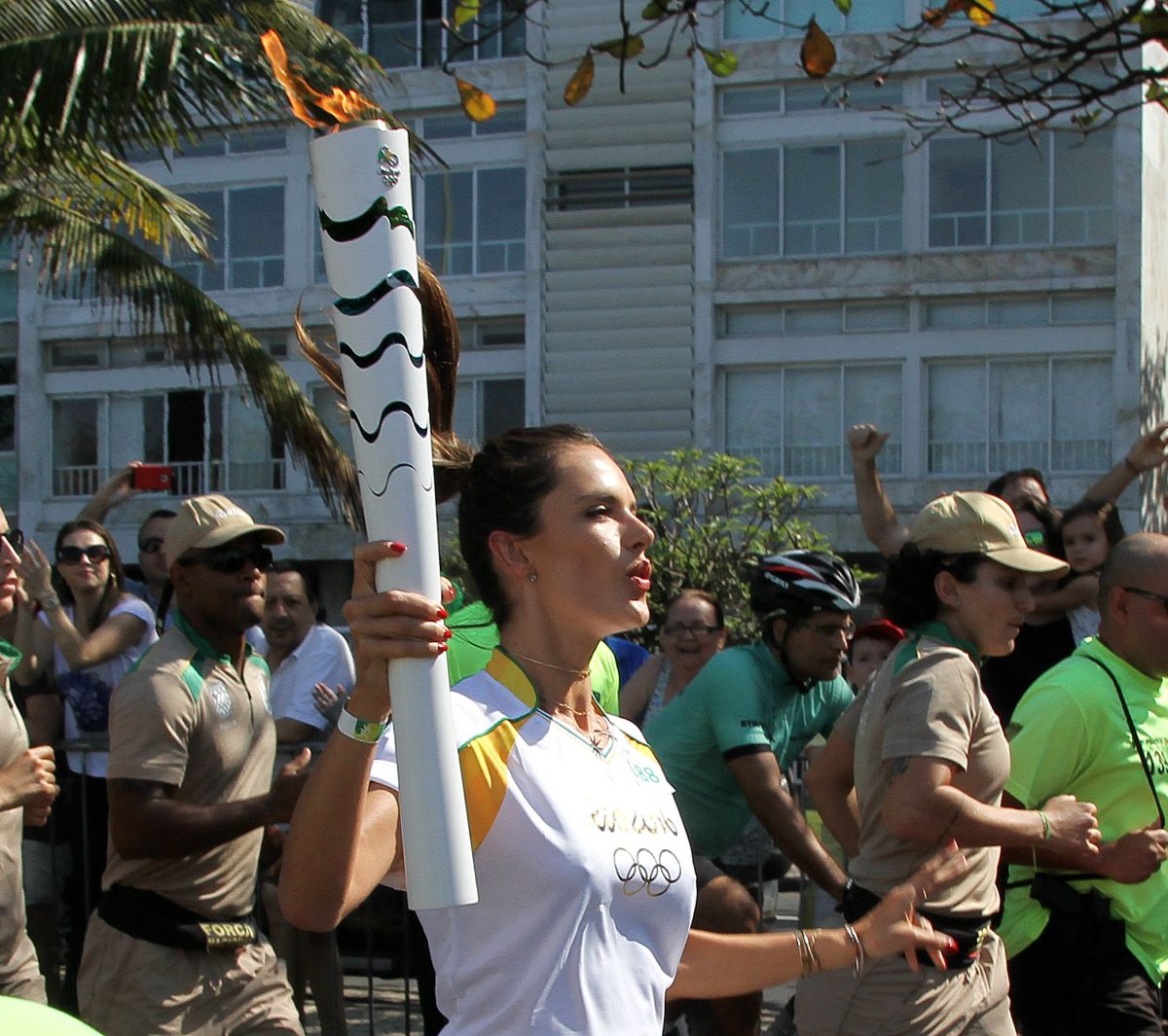 Alessandra Ambrosio Runs With Olympic Flame Through Rio De Janeiro