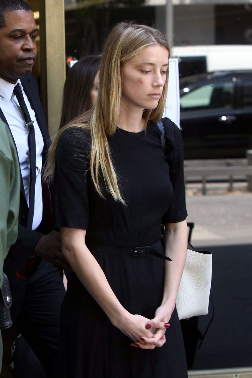 Amber Heard Visibly Bruised Leaves Court Los Angeles