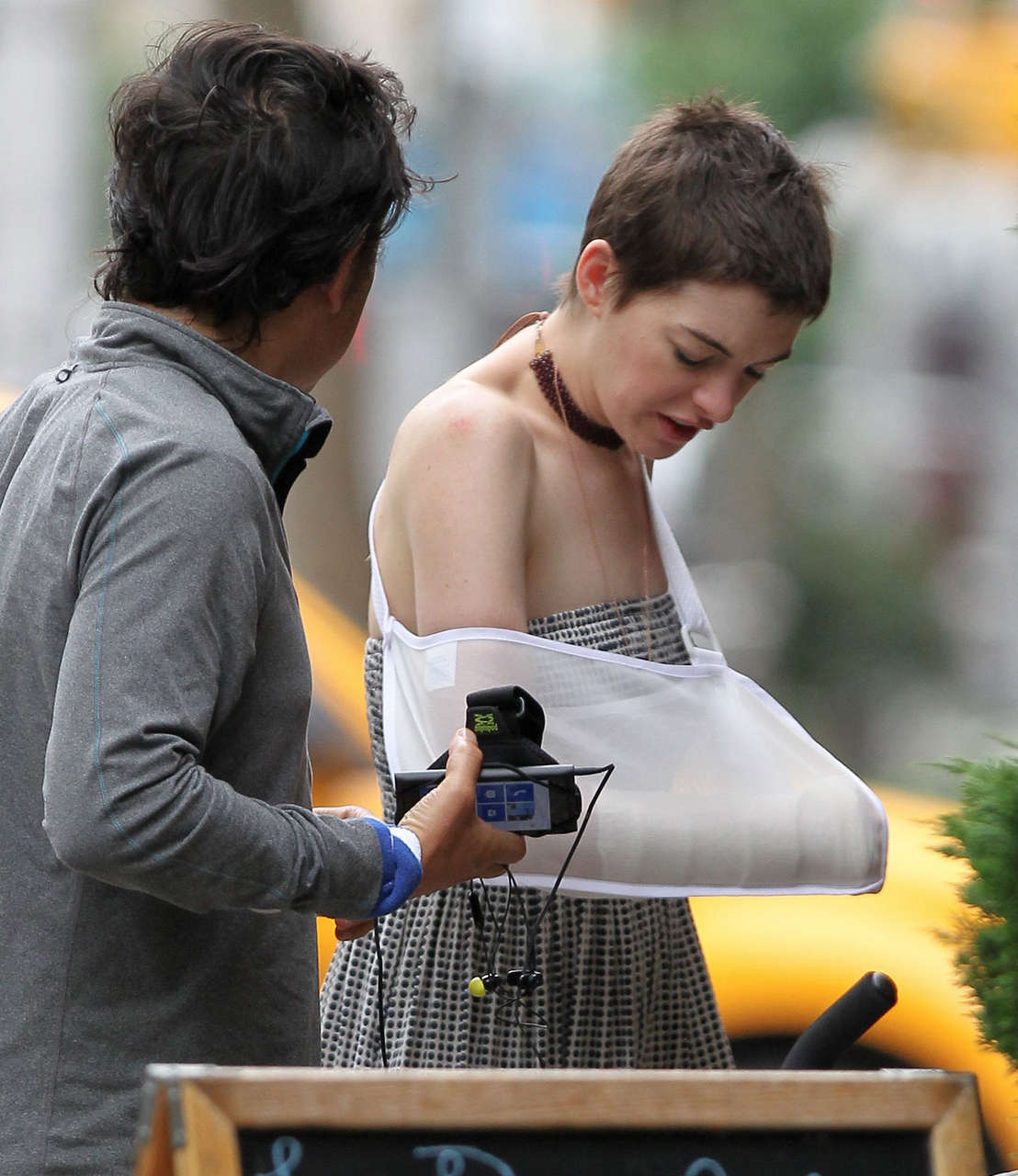 Anne Hathaway Wears An Arm Sling Out About Brooklyn