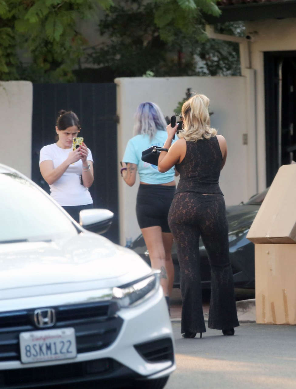 Bebe Rexha Gets New Ferrari Delivered To Her Home Los Angeles