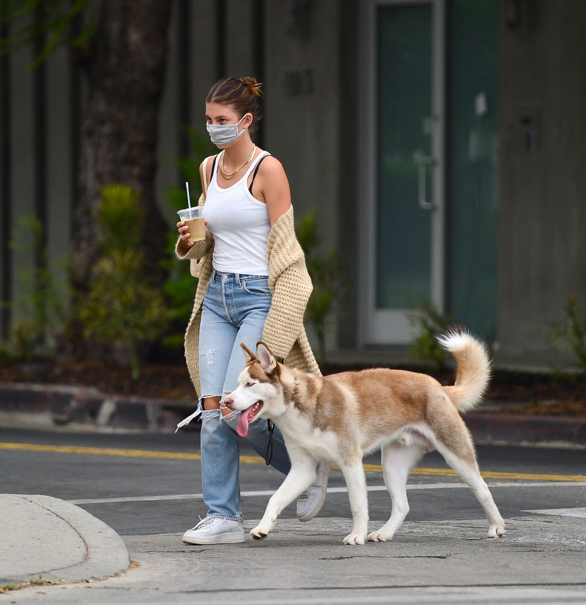 Camila Morrone Ripped Denim Out With Her Dog Los Angeles