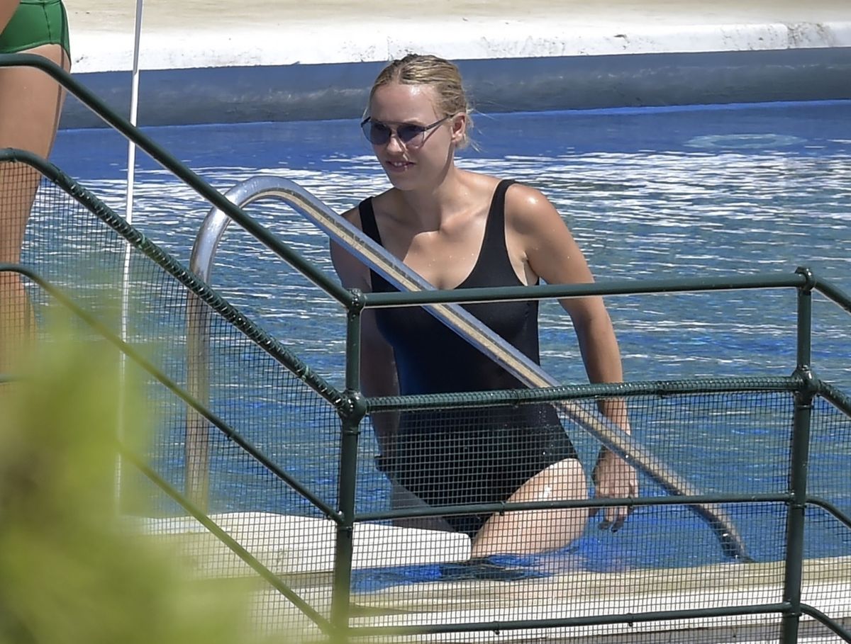 Caroline Wozniacki Black Swimsuit Pool Italy