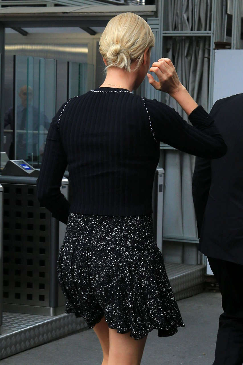 Charlize Theron Out About Milan