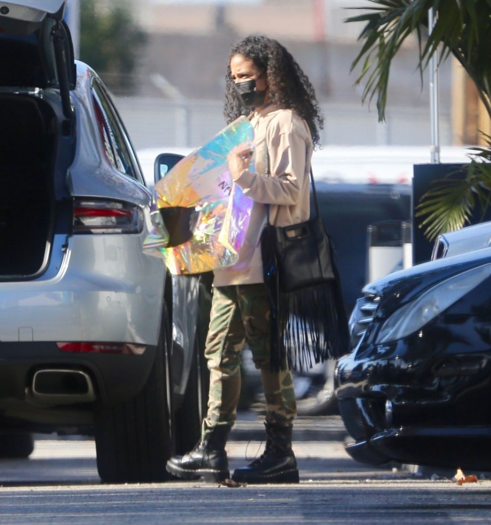 Christina Milian Arrives Back From New Years Day Trip To Las Vegas