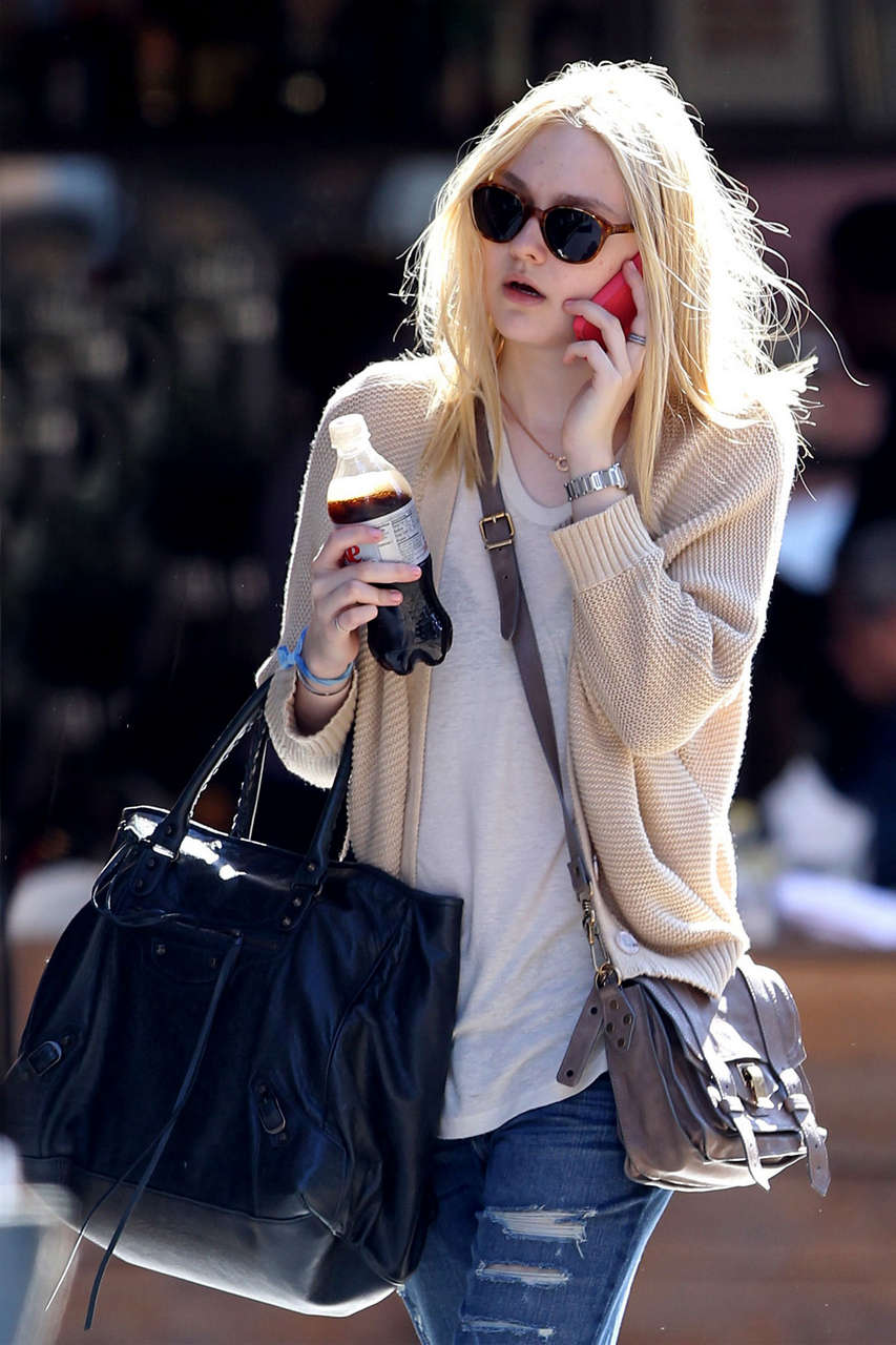 Dakota Fanning Ripped Jeans Out About New York
