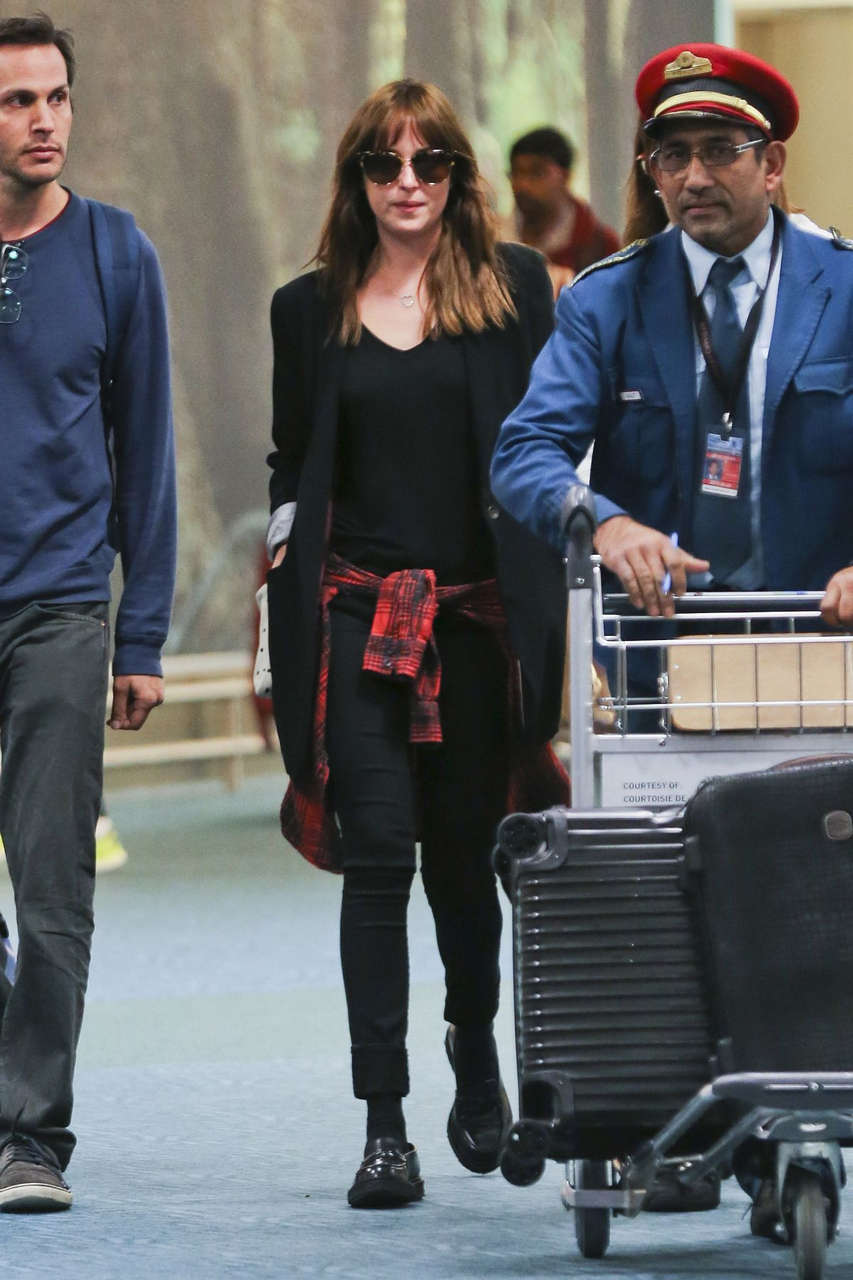 Dakota Johnson Arrives Airport Vancouver