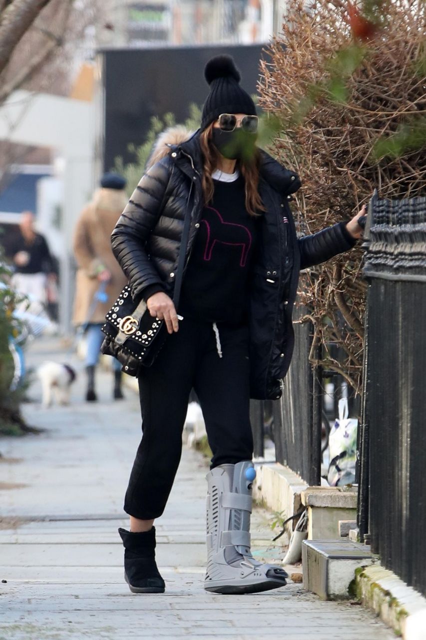 Elizabeth Hurley Sporting Her Ankle Brace Out London