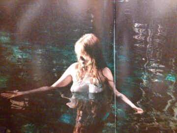 Florence Welch From Florence And The Machine Swimming In A Very Seethrough Shirt From The How Big How Blue How Beautiful Deluxe Cd Booklet