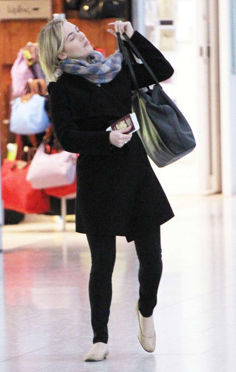 Kate Winslet Arrives Heathrow Airport