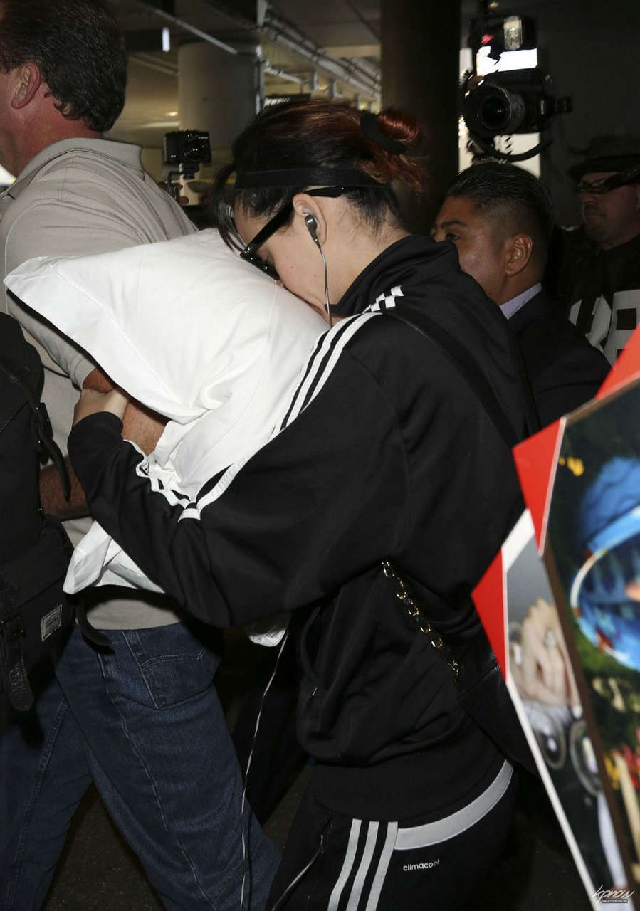 Katy Perry Hiding Face Pillow Lax Airport