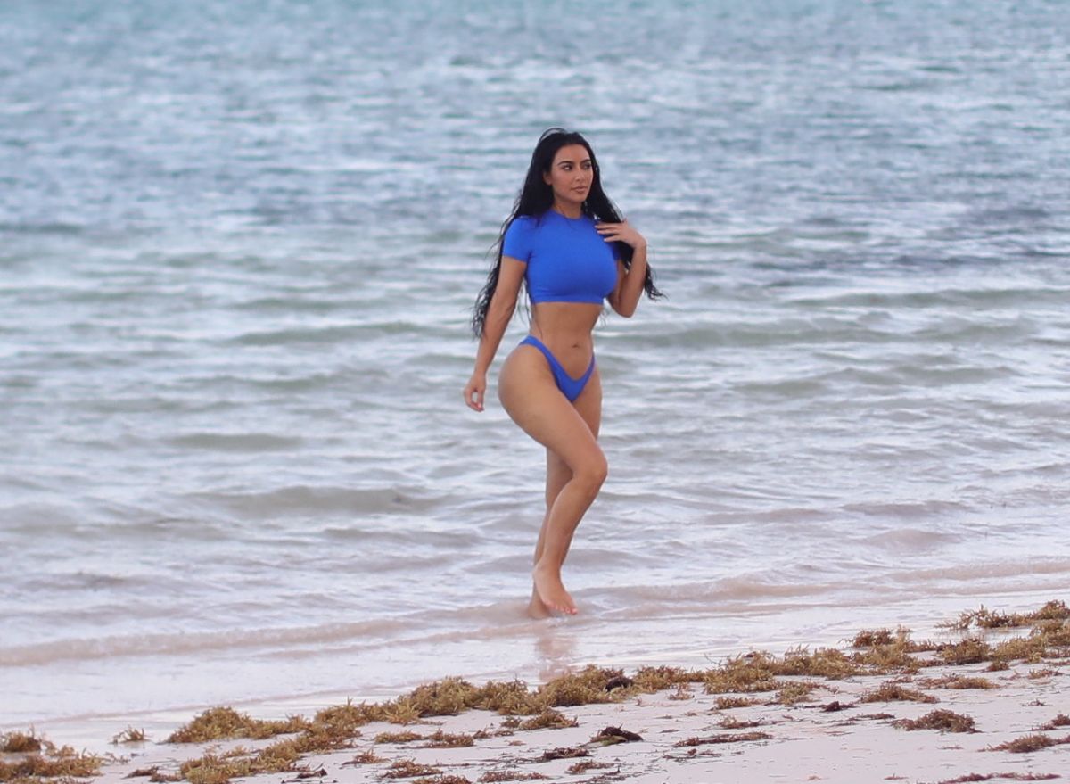 Kim Kardashian Bikini Photoshoot For Her Skims Swimwear Line