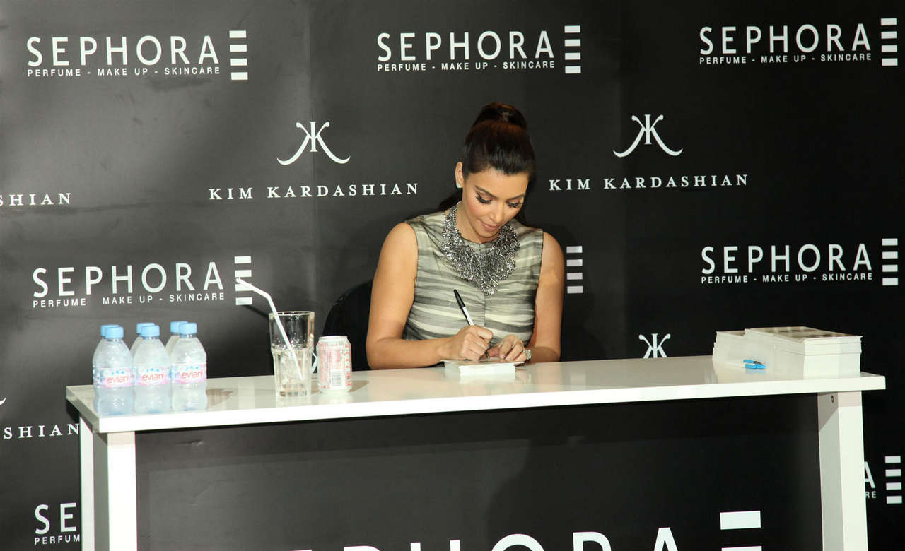 Kim Kardashian Signs Autographs