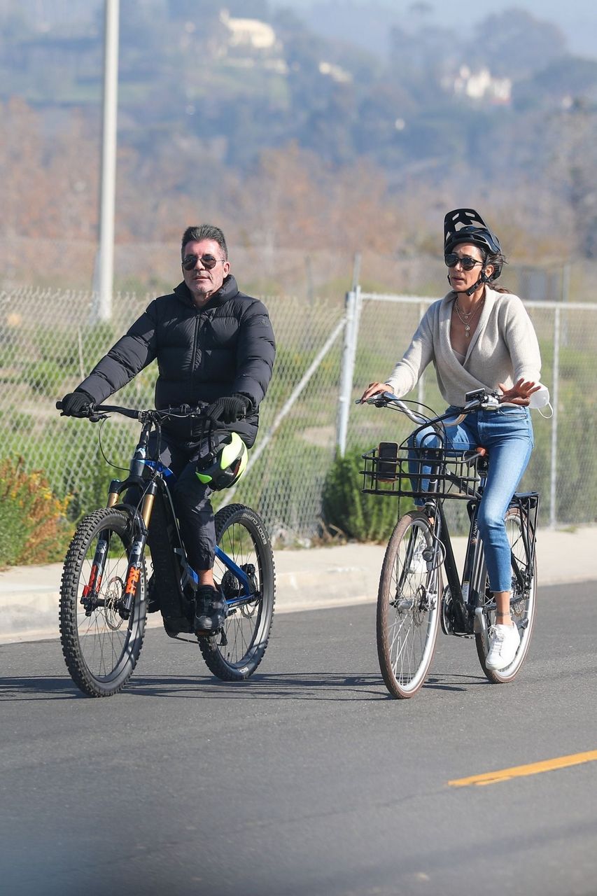 Lauren Silverman And Simon Cowell Riding Bikes Out Malibu