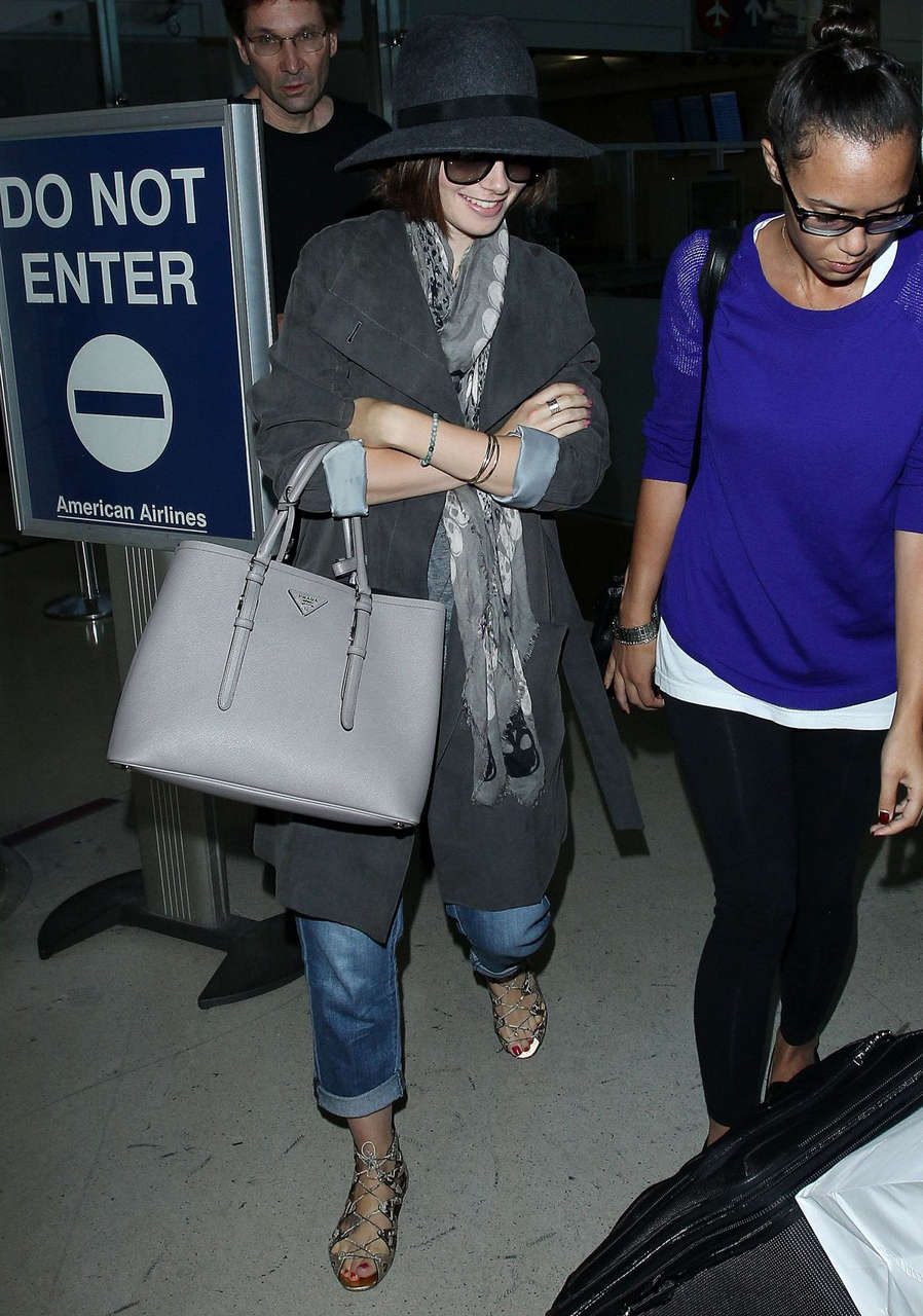 Lily Collins Ar Los Angeles International Airport