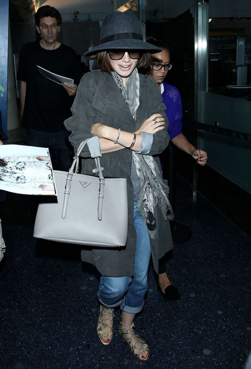 Lily Collins Ar Los Angeles International Airport