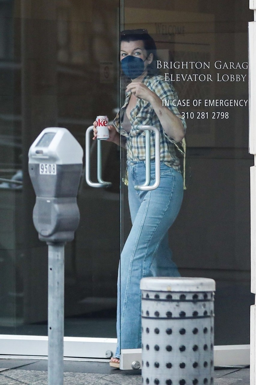 Milla Jovovich Out Shopping Rodeo Drive Beverly Hills