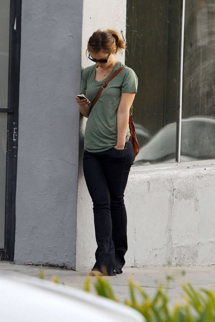 Olivia Wilde Playing With Her Iphone Los Angeles