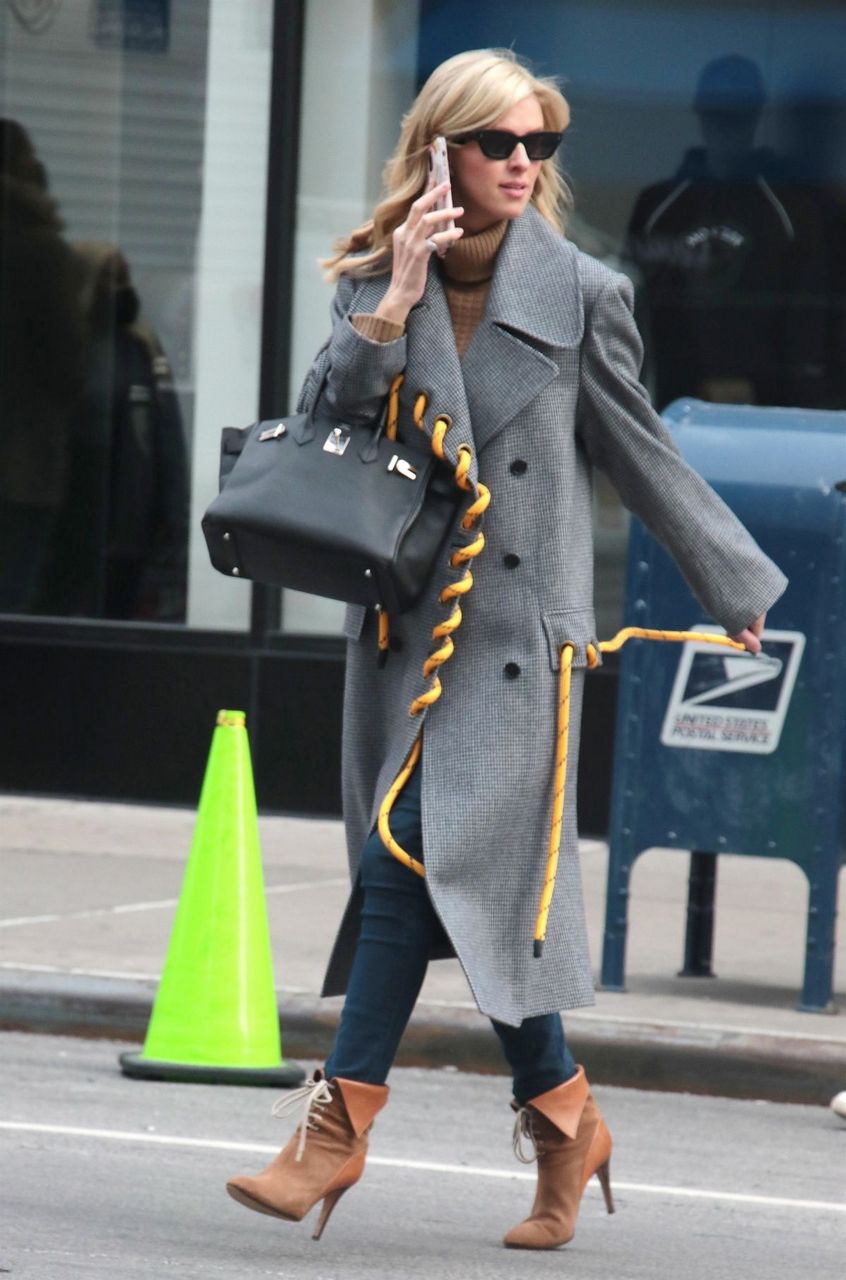 Paris And Nicky Hilton Out And About New York