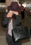 Selena Gomez Hiding From Paps Lax Airport